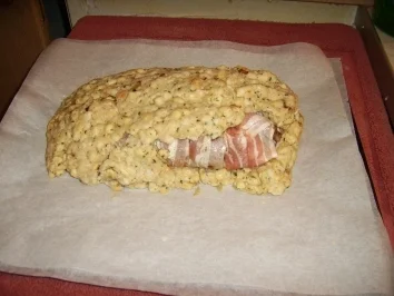 Rezept: Schweinsfilet im Knödelhemd mit Knoblauchsauce Schweinsfilet im Knödelhemd mit Knoblauchsauce - Rezept