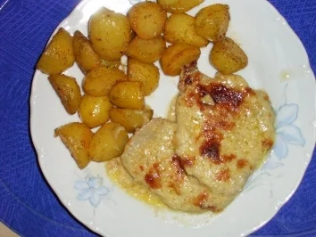 Rezept: Schweinsschnitzel mit Zwiebel - Käsesauce Schweinsschnitzel mit Zwiebel - Käsesauce - Rezept