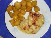 Schweinsschnitzel mit Zwiebel - Käsesauce - Rezept