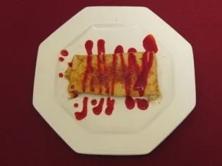 Rezept: Quark-Mohn-Mousse im Crepe Quark-Mohn-Mousse im Crepe - Rezept