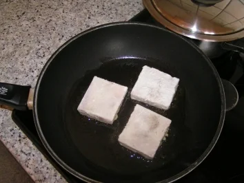 Dorsch auf Orangensosse mit Curryreis im Mandarinennest - Rezept