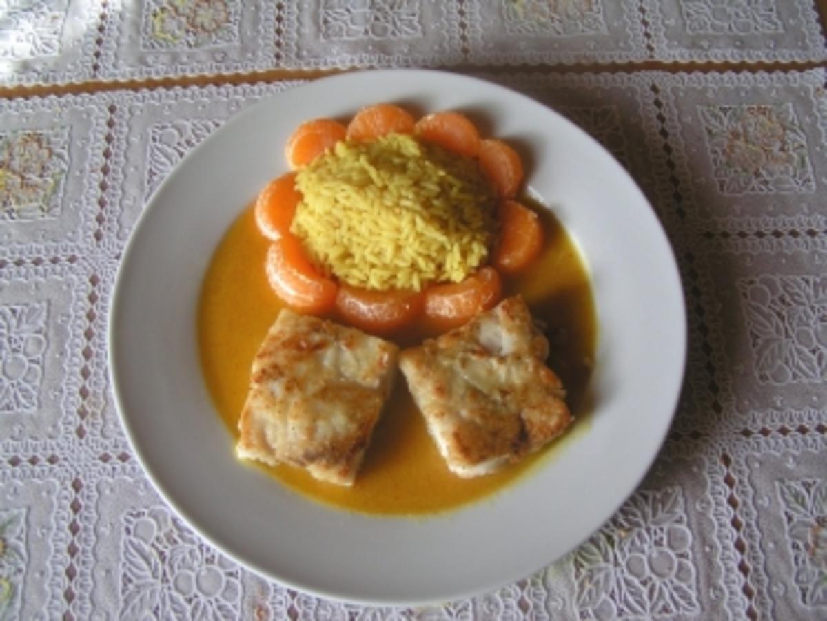 Dorsch auf Orangensosse mit Curryreis im Mandarinennest - Rezept