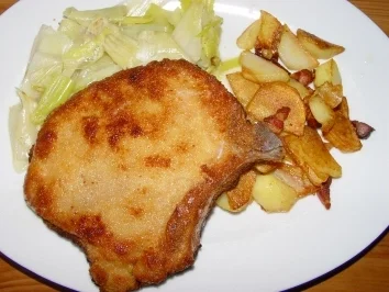 Rezept: Gemüse : Porree - Gemüse mit paniertem Kotelett und Röstkartoffeln Gemüse : Porree - Gemüse mit paniertem Kotelett und Röstkartoffeln - Rezept