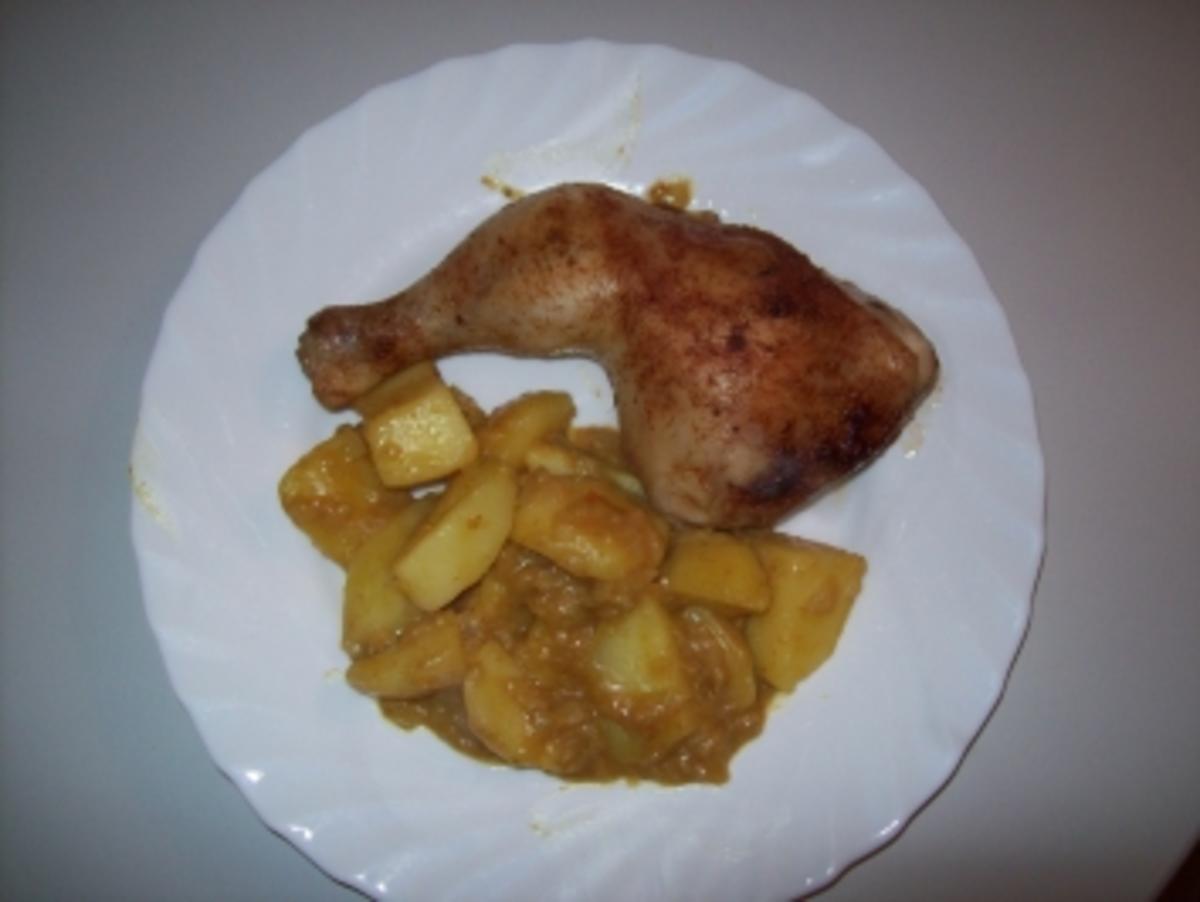 Kartoffel - Zwiebel - Curry mit gegrilltem Hähnchenschenkel - Rezept