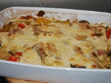 Rezept: Überbackener Seelachs auf mediterranem Gemüsebett Überbackener Seelachs auf mediterranem Gemüsebett - Rezept