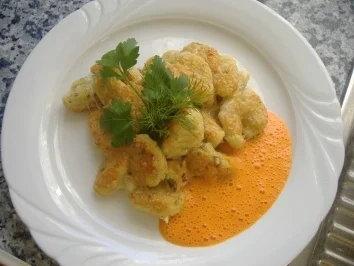 Kräuter-Ricotta-Gnocchi goldbraun überbacken mit Paprikacreme - Rezept