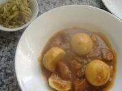 Rindersaftgulasch mit Knödel und Bohnensalat - Rezept
