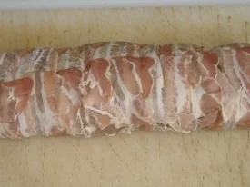 Schweinefilet mit Champignonfüllung im Schinkenmantel - Rezept