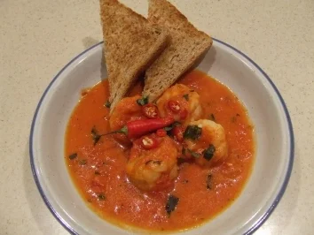 Rezept: King-Prawns eingetaucht in einer scharfen Thai-Tomatensoße King-Prawns eingetaucht in einer scharfen Thai-Tomatensoße - Rezept