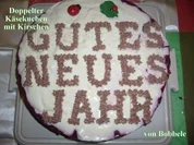 Kuchen: Doppelter Käsekuchen mit Kirschen - Rezept