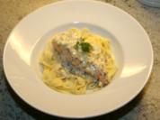 Lachs in Weißweinsoße mit Tagliatelle - Rezept