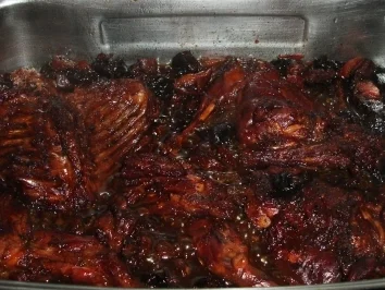 Kaninchen mit getrockneten Pflaumen und Rosinen in Rotweinsauce - Rezept - Bild Nr. 4