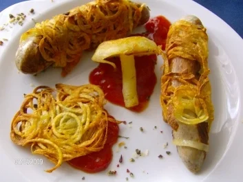 Verwickelte Bratwürste nebst Kartoffelpilz (Spiralschneider-Rezept) - Rezept