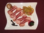 Wildschinken an süßsaurem Salatbett - Rezept