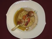 Spieß von Jakobsmuscheln und Scampi auf Kokosrisotto und Thai-Curryschaum - Rezept