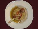 Spieß von Jakobsmuscheln und Scampi auf Kokosrisotto und Thai-Curryschaum - Rezept