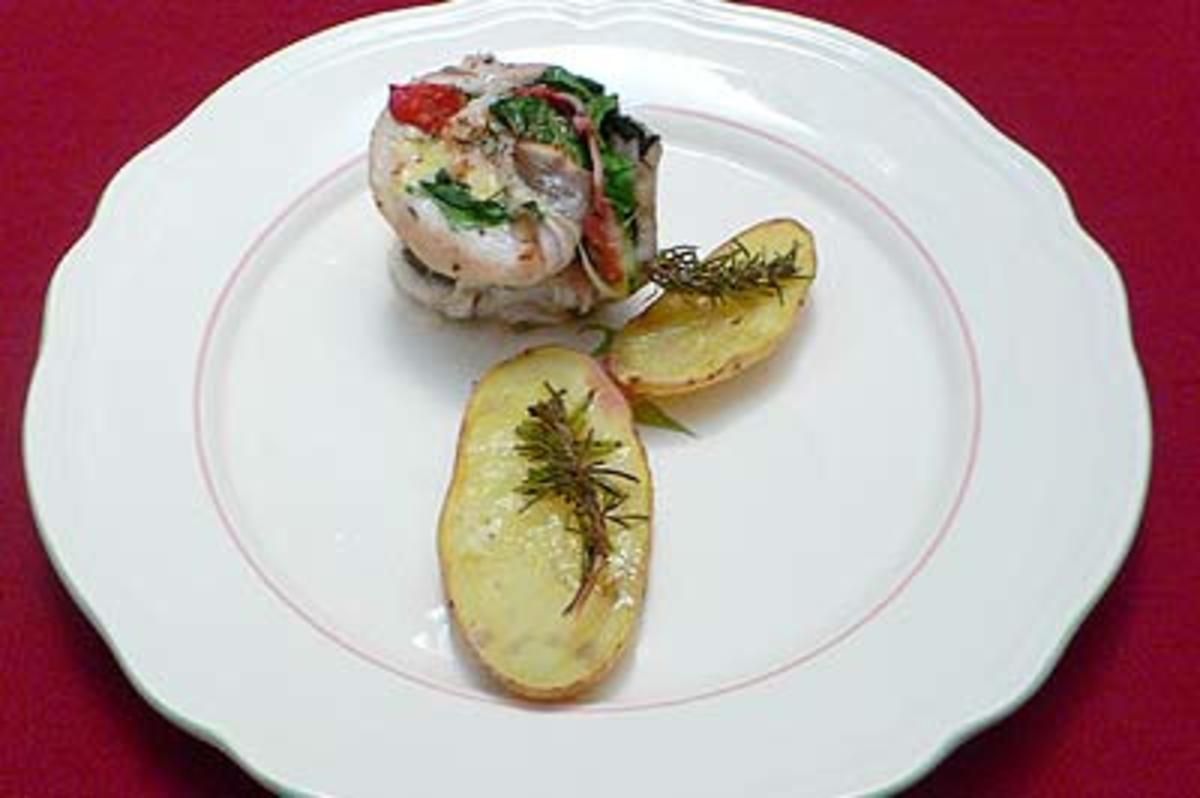 Rezept: Seehechtrollen mit Rosmarinkartoffeln Seehechtrollen mit Rosmarinkartoffeln - Rezept