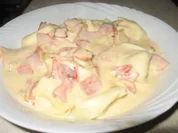 Käsetortellini in Schinken-Käsesauce - Rezept