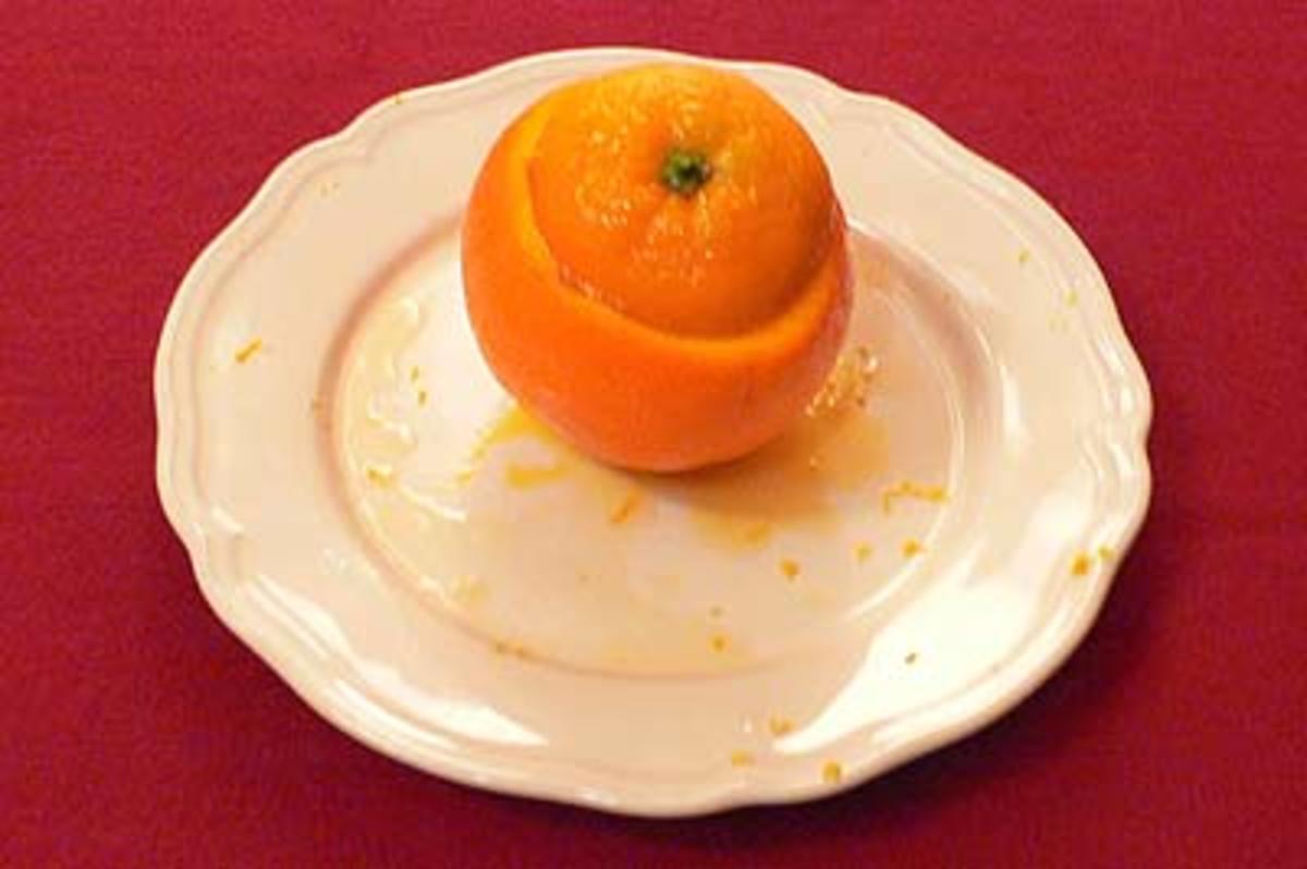 Citrus-Safransorbet in Navelorangen an Orangenlikör-Champagner-Frappé