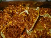 Spitzpaprika mit Hack, Mais und Käse gefüllt - Rezept