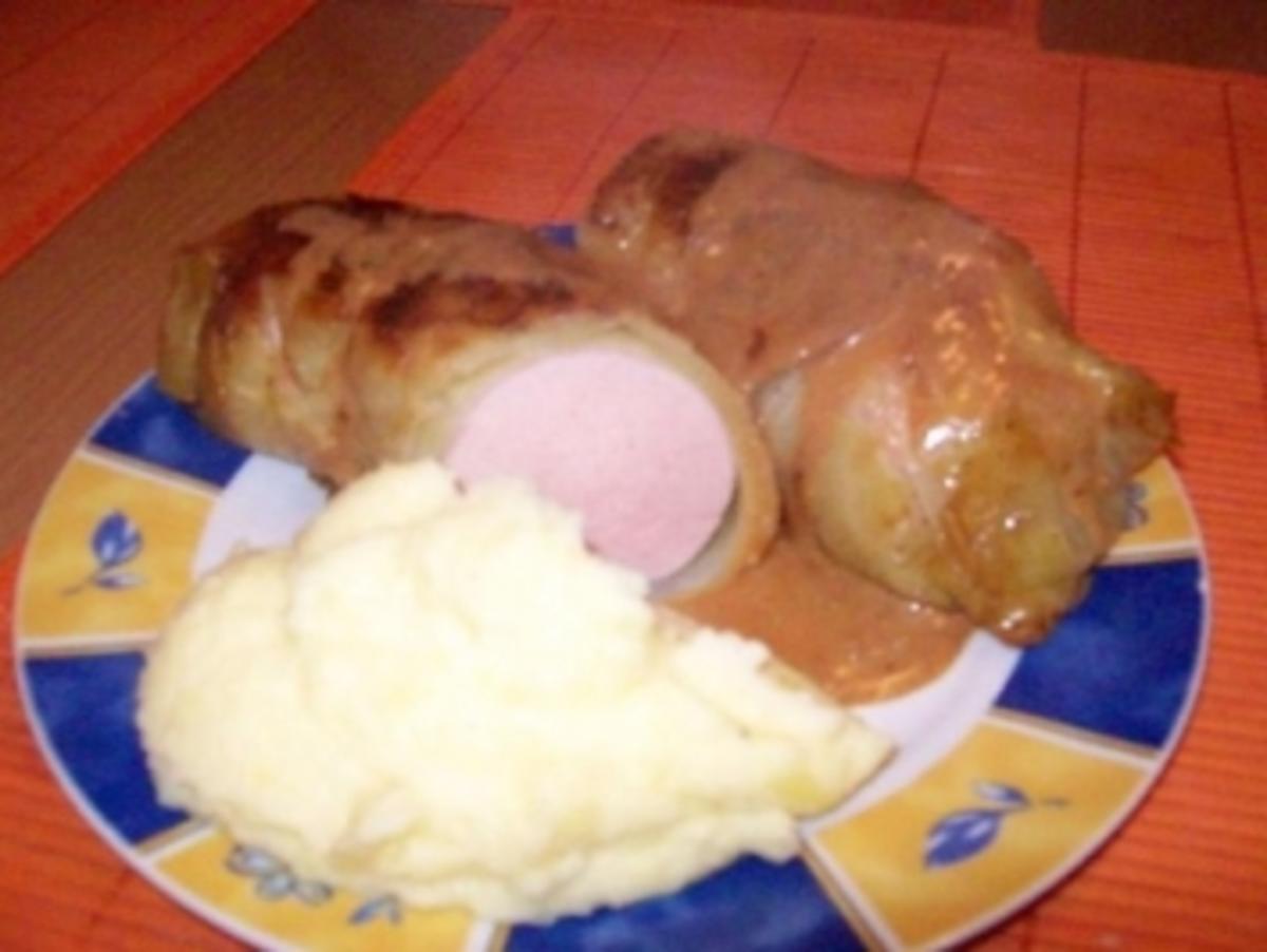 Bilder für Fleischwurst in Kohlblättern - Rezept