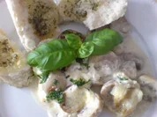 Champignons in Käse-Weißweinsoße - Rezept