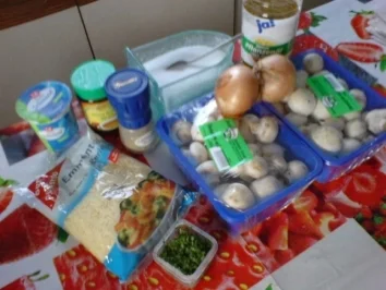 Champignons in Käse-Weißweinsoße - Rezept