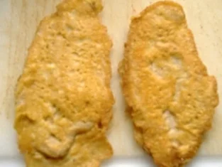 Kalbsfilet im Parmesanmantel mit Tomate und Käse überbacken - Rezept