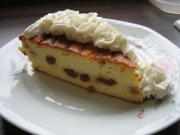 Käsekuchen mit Amarettorosinen - Rezept
