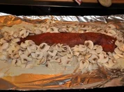 überbackenes Schweinefilet mit Pilzen in Alufolie - Rezept