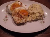 Putenschnitzel mit Bacon und Spiegelei - Rezept