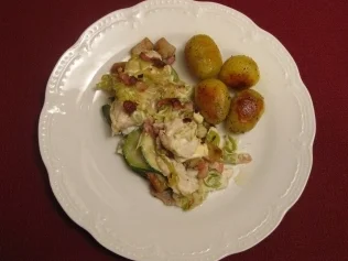 Rezept: Steinbeißerfilet im Champignon-Gemüsebett Steinbeißerfilet im Champignon-Gemüsebett - Rezept