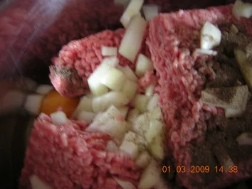 Gefüllte Paprikaschote mit Speckmantel - Rezept