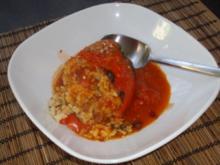 Paprika gefüllt mit Reis und Putenbruststreifen - Rezept