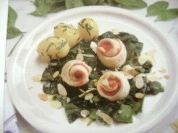 Rezept: Fischröllchen auf Spinat Fischröllchen auf Spinat - Rezept