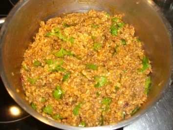 gefüllte Paprika in Tomatensoße - Rezept