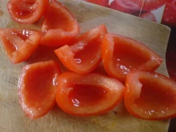 Basilikum-Putenschnitzel mit Reis gefüllt und in Parmesan-Ei gebraten - Rezept