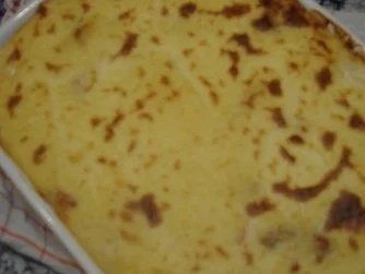 Eisbein mit Sauerkraut und Kartoffelgratinsauce - Rezept