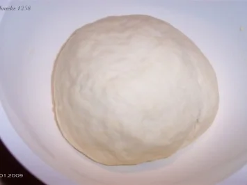 Pizza "nach Art des Hauses" - Rezept