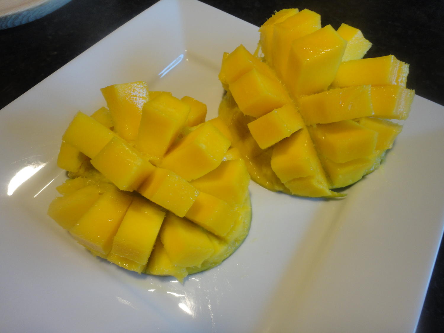 Mango zerteilen und servieren? ganz einfach Tipp kochbar.de