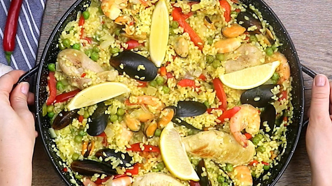 Paella mit Hähnchen Paella mit Hähnchen
